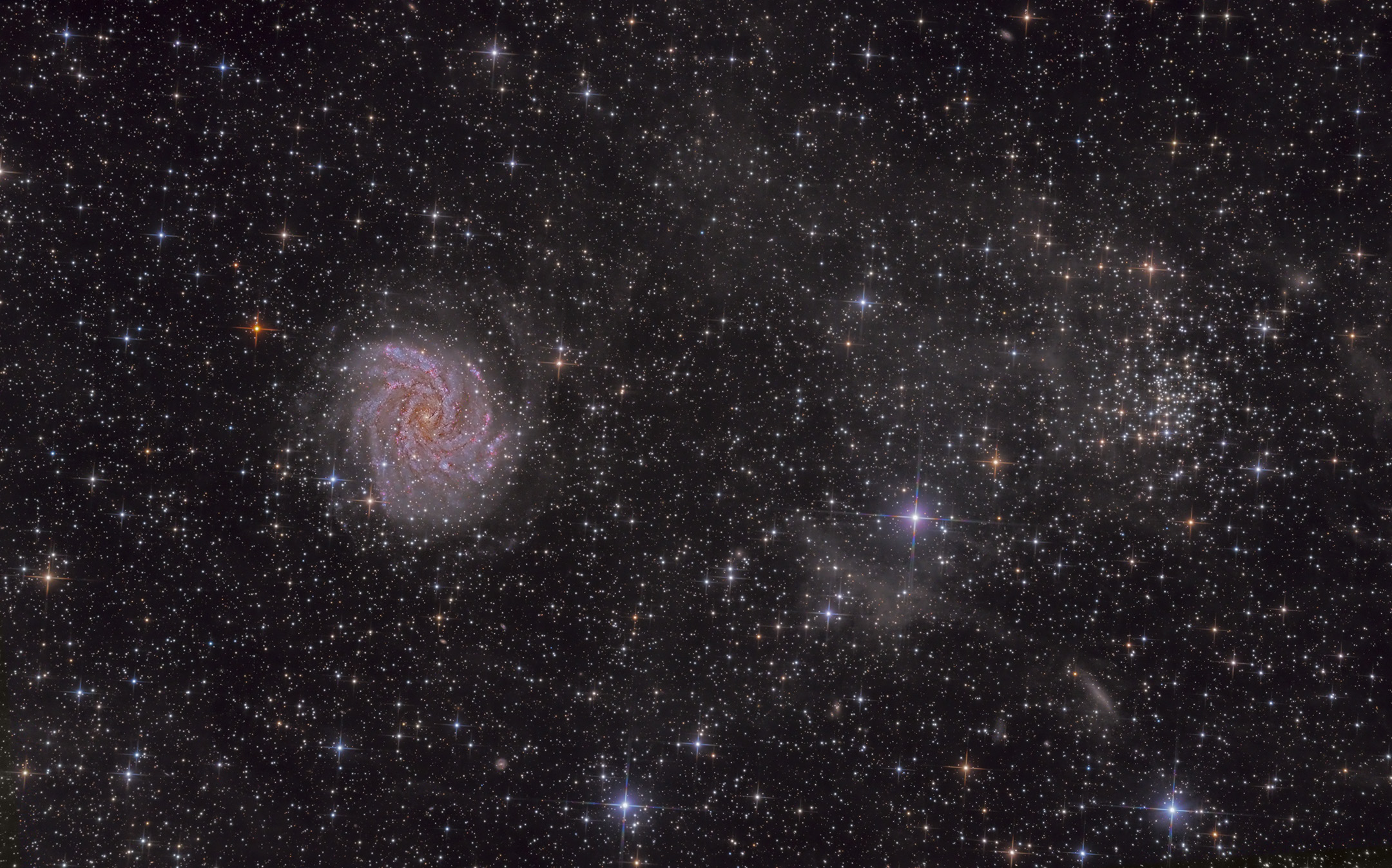 Fireworks Galaxy and cluster image
